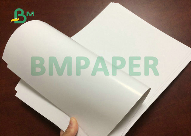 hoja de papel revestida brillante de 70 del x 100cm 90grams 115grams para la impresión en offset