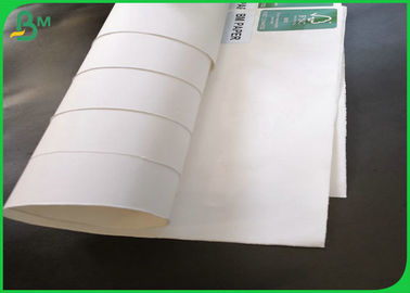 Engrase resistente papel de Kraft blanco cubierto lado de la categoría alimenticia de 100gsm + de 10gsm PE uno para envolver la comida