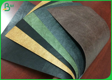 Diferente modelo de tejido de papel impermeable para el material de pulsera de color