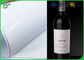 Alta superficie lisa 80gsm 85gsm 90gsm del papel de rollo enorme de la blancura para las etiquetas del vino
