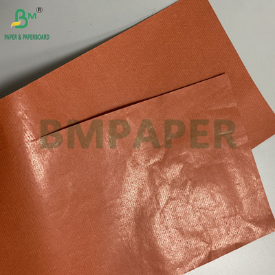 Papel Kraft de 42 gramos con rayas rojas para envolver frutas con cera de un lado