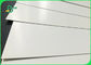 papel de arte puro de la blancura C2S de la pulpa de madera de 90gsm 100gsm 128gsm alto FSC certificado